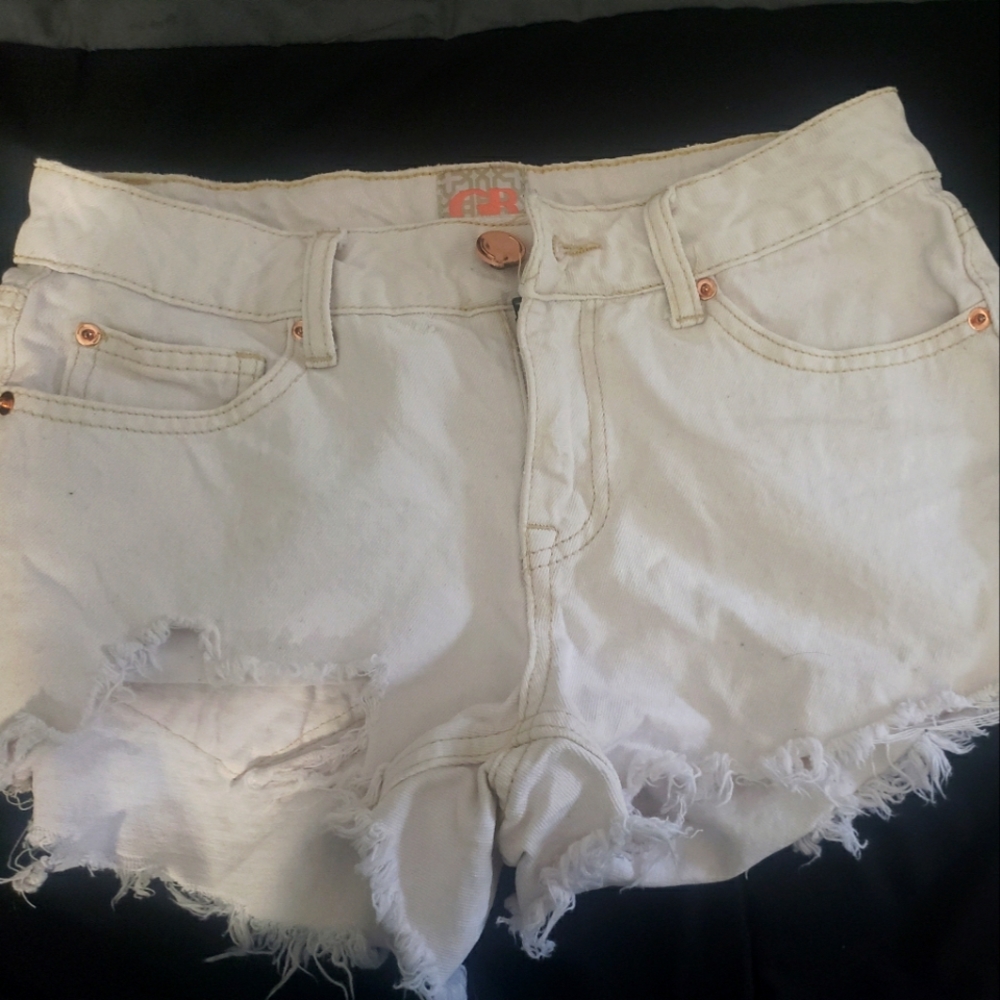 White distressed jean shorts
